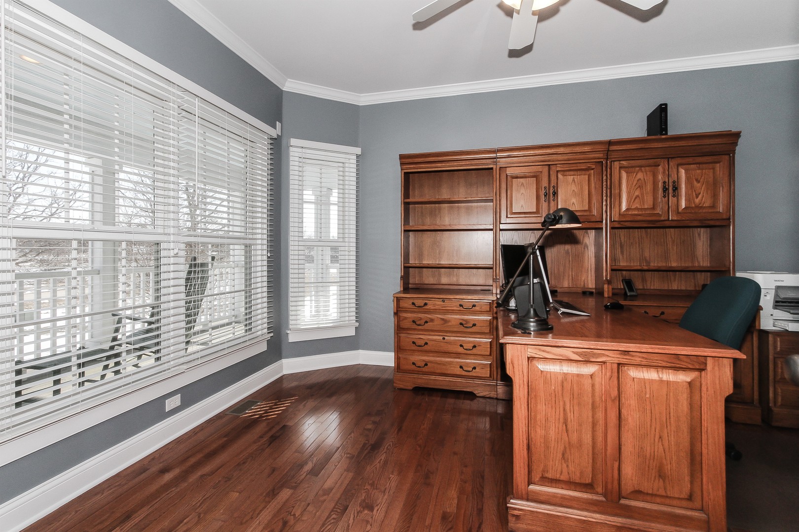 8762 Country Shire Lane Spring Grove, IL 60081 - Photo 7 of 39 a view of a room with wooden floor windows and entryway