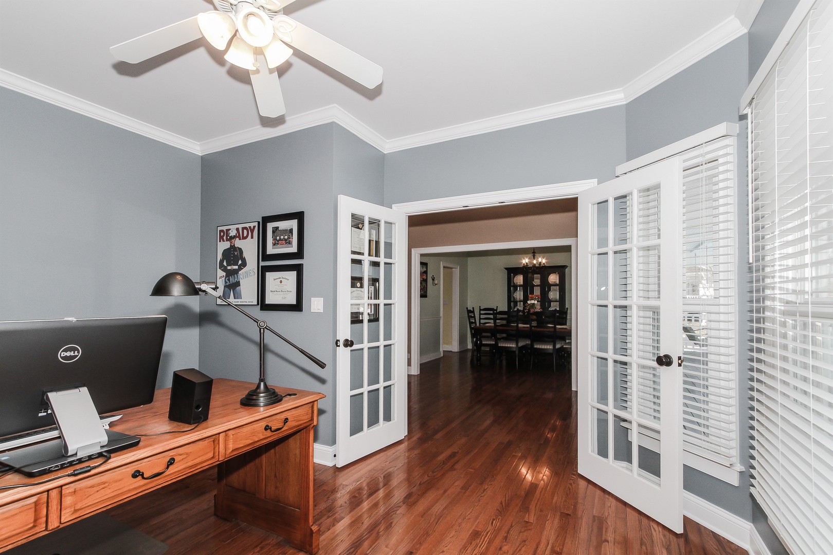 8762 Country Shire Lane Spring Grove, IL 60081 - Photo 8 of 39 a view of a workspace with furniture and a window