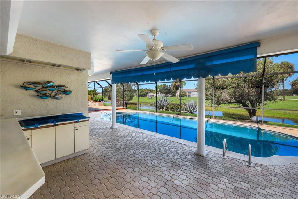 2227 Regal Way Naples, FL 34110 - Photo 24 of 34 Summer Kitchen Area