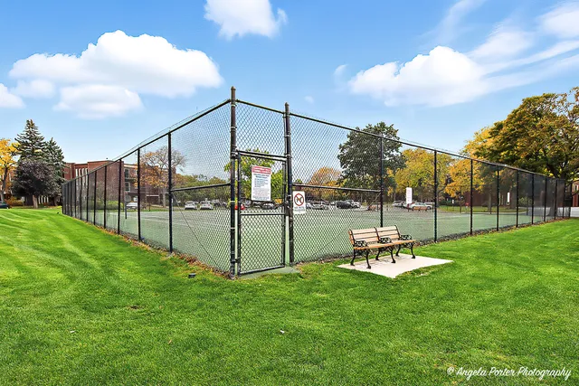 a view of a park with swings and slides