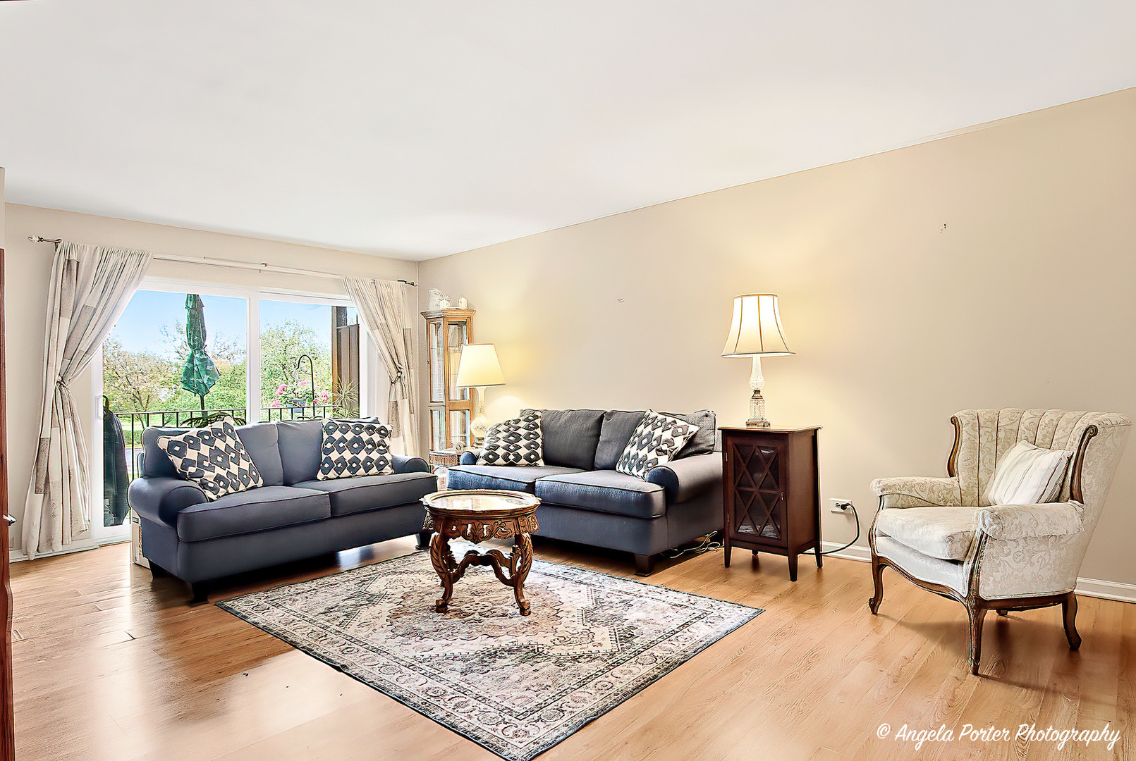 1425 Sandpebble Drive, Unit 227 Wheeling, IL 60090 - Photo 3 of 21 a living room with furniture and a rug