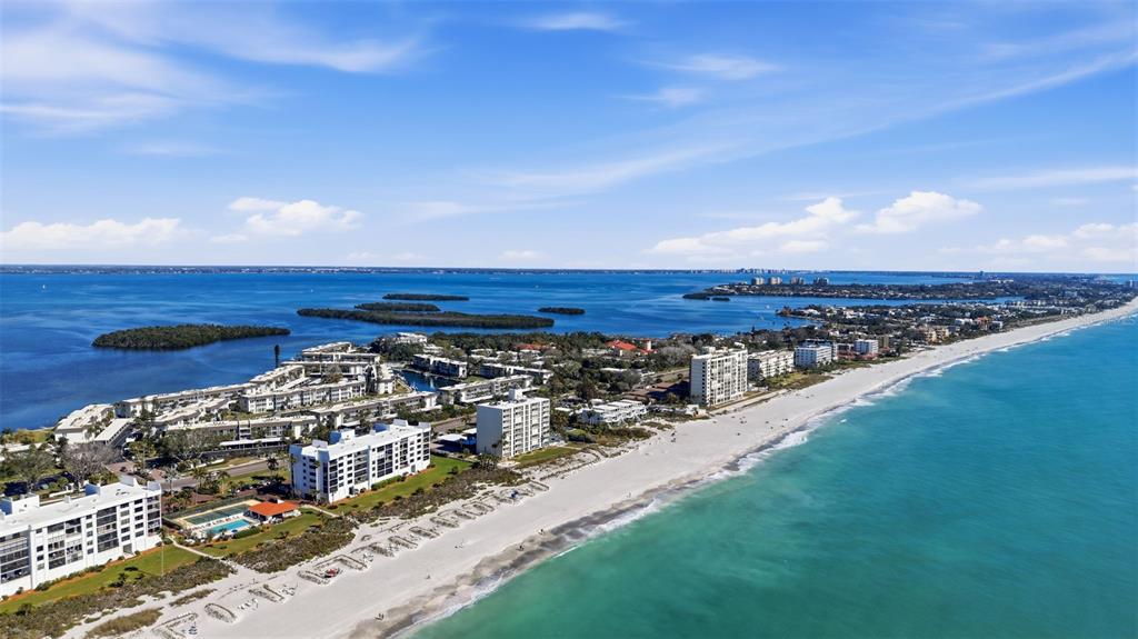 4440 Exeter Drive, Unit 106 Longboat Key, FL 34228 - Photo 21 of 26 a view of a city and an ocean view