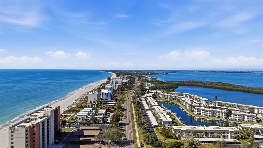 4440 Exeter Drive, Unit 106 Longboat Key, FL 34228 - Photo 22 of 26 a view of city with ocean