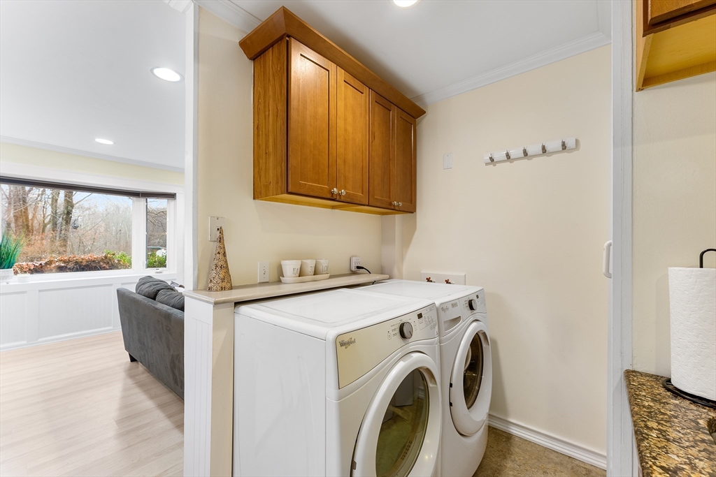 64 Cedar Hill Road Northborough, MA 01532 - Photo 11 of 27 a utility room with dryer and washer