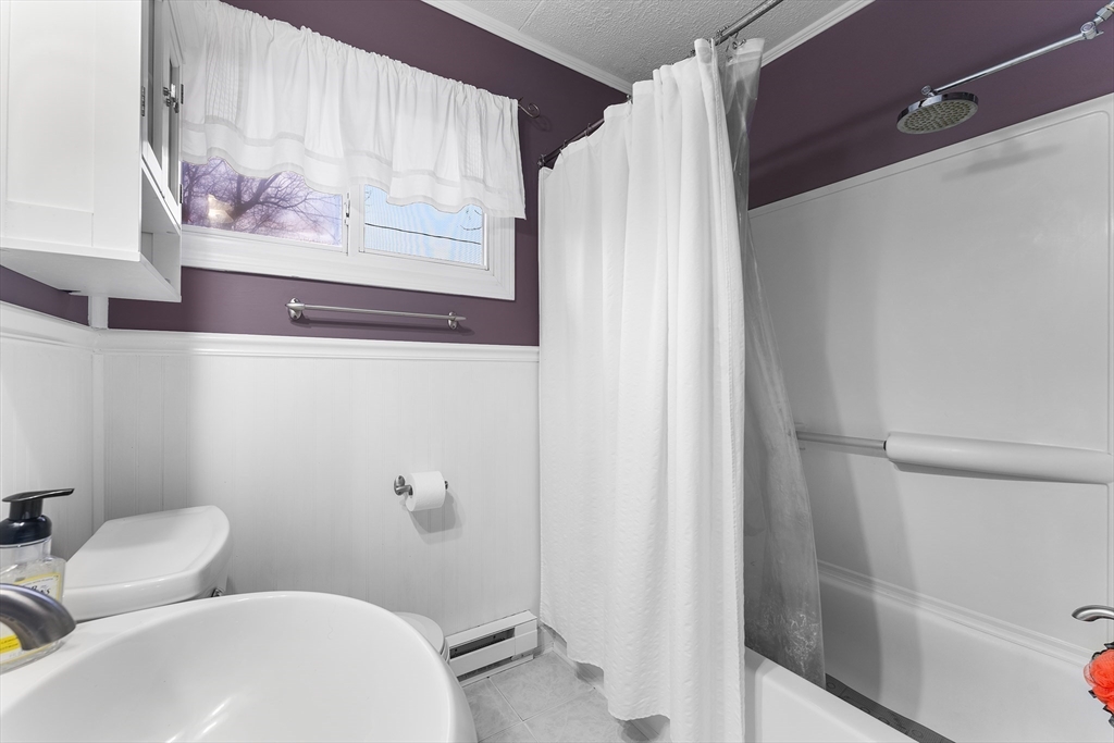 64 Cedar Hill Road Northborough, MA 01532 - Photo 13 of 27 a bathroom with a sink and toilet