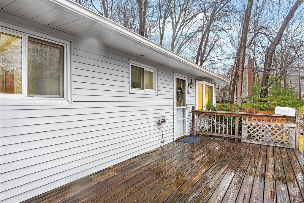 64 Cedar Hill Road Northborough, MA 01532 - Photo 20 of 27 a view of a wooden deck