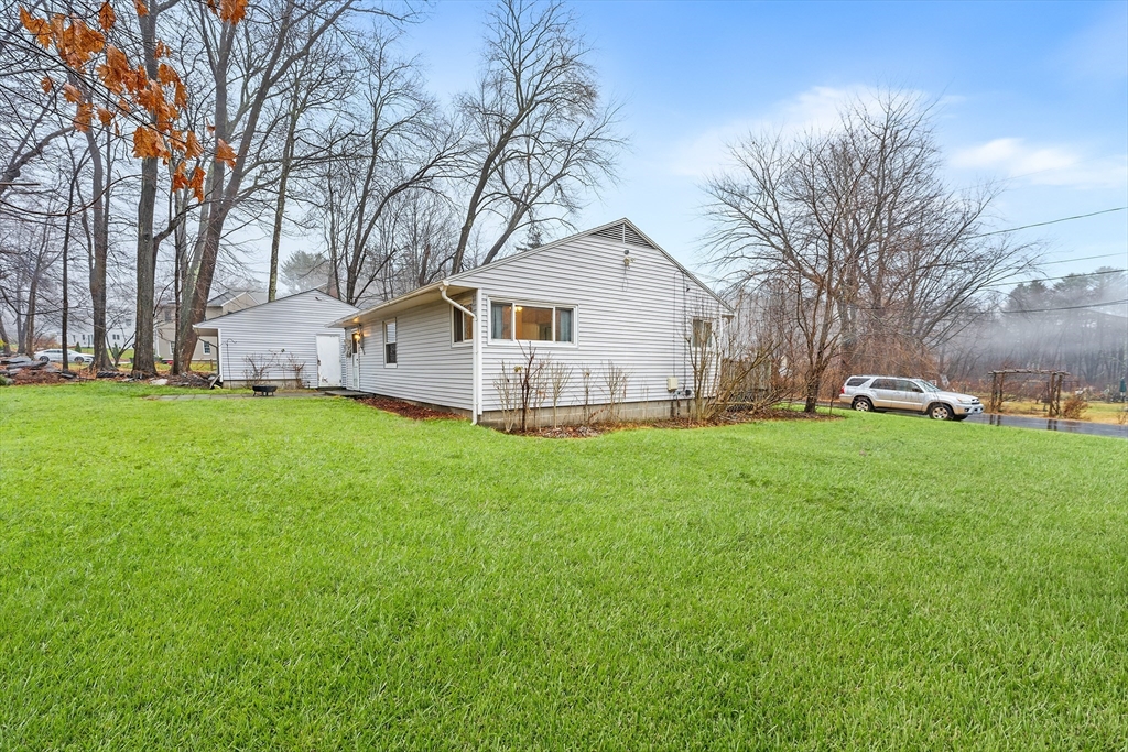 64 Cedar Hill Road Northborough, MA 01532 - Photo 22 of 27 a view of a house with a yard