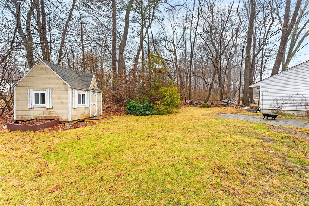 64 Cedar Hill Road Northborough, MA 01532 - Photo 24 of 27 a view of a house with snow on the background