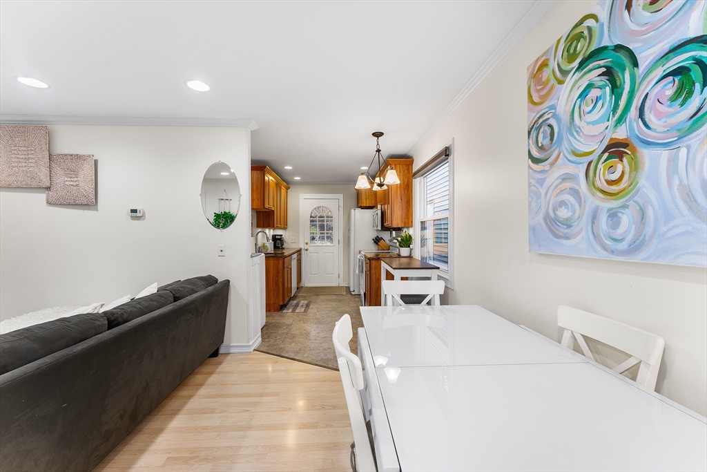 64 Cedar Hill Road Northborough, MA 01532 - Photo 4 of 27 a bedroom with a bed and painting on the wall