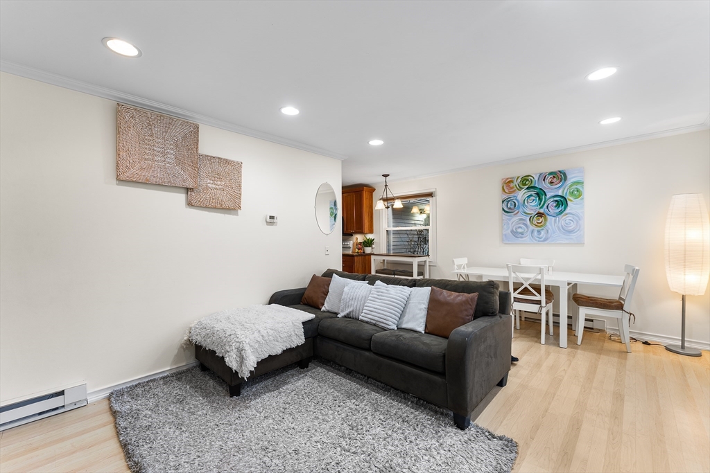 64 Cedar Hill Road Northborough, MA 01532 - Photo 6 of 27 a living room with furniture and a couch