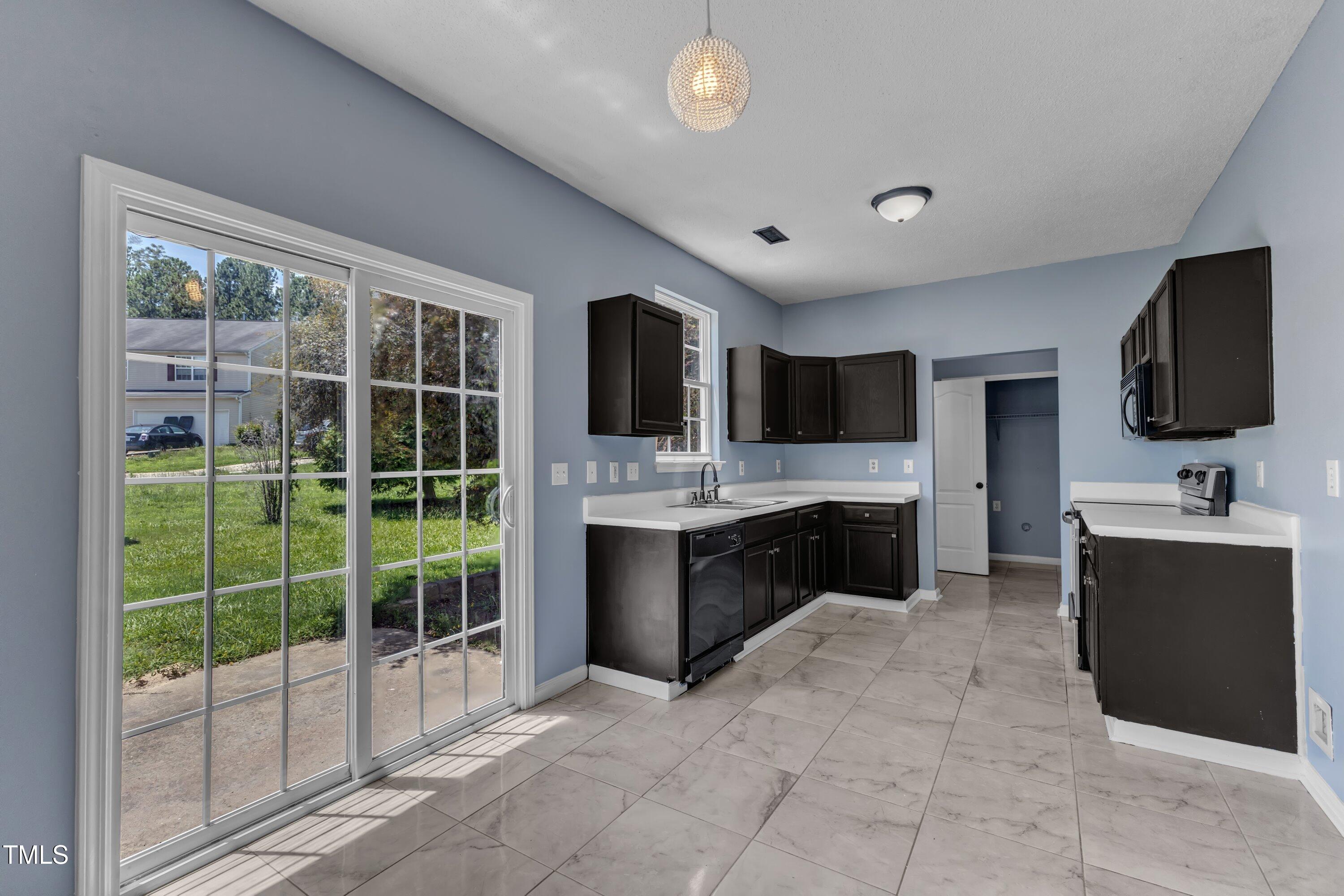3604 Rivermist Drive Raleigh, NC 27610 - Photo 17 of 48 a large bathroom with a large tub and sink