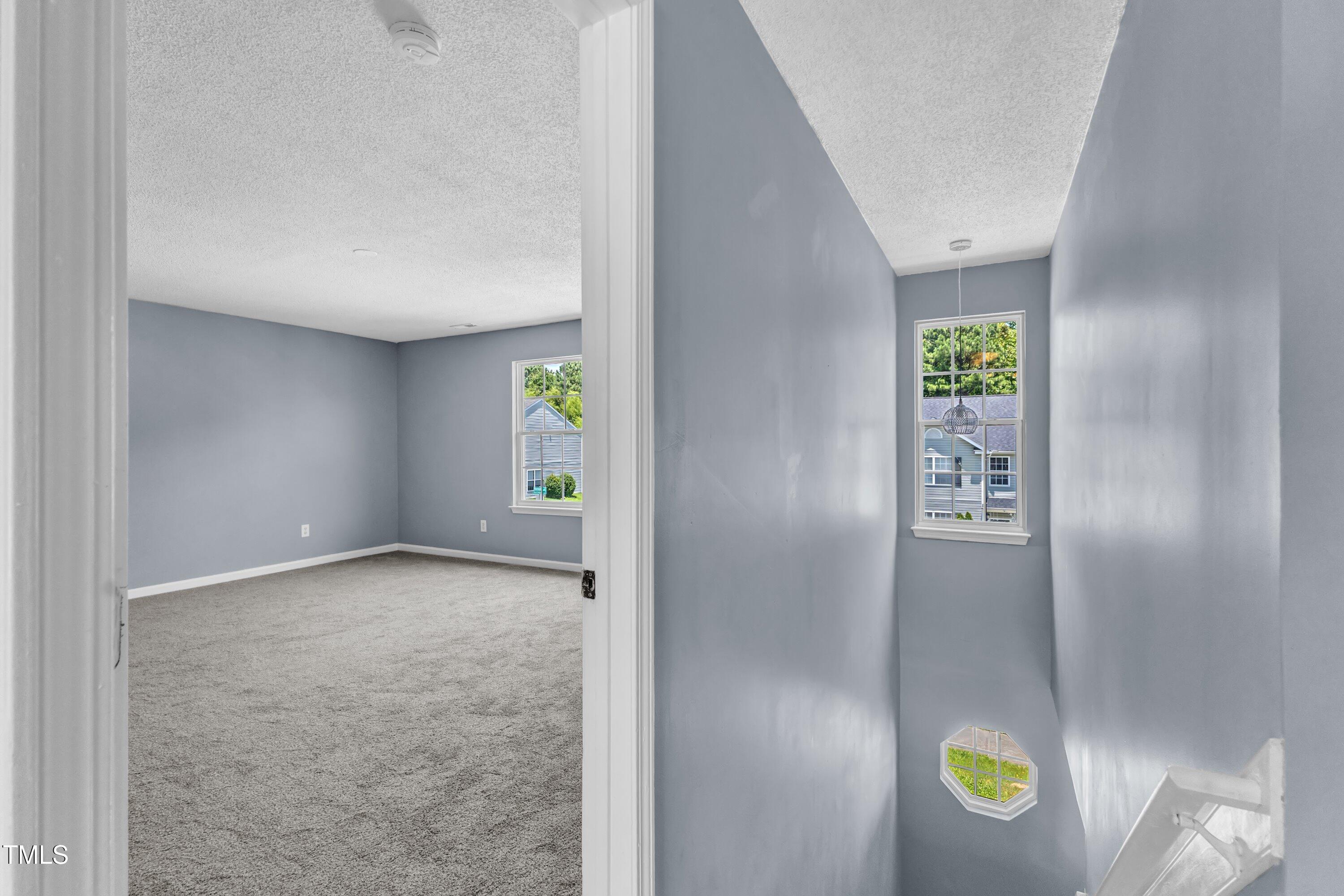 3604 Rivermist Drive Raleigh, NC 27610 - Photo 31 of 48 a view of an empty room