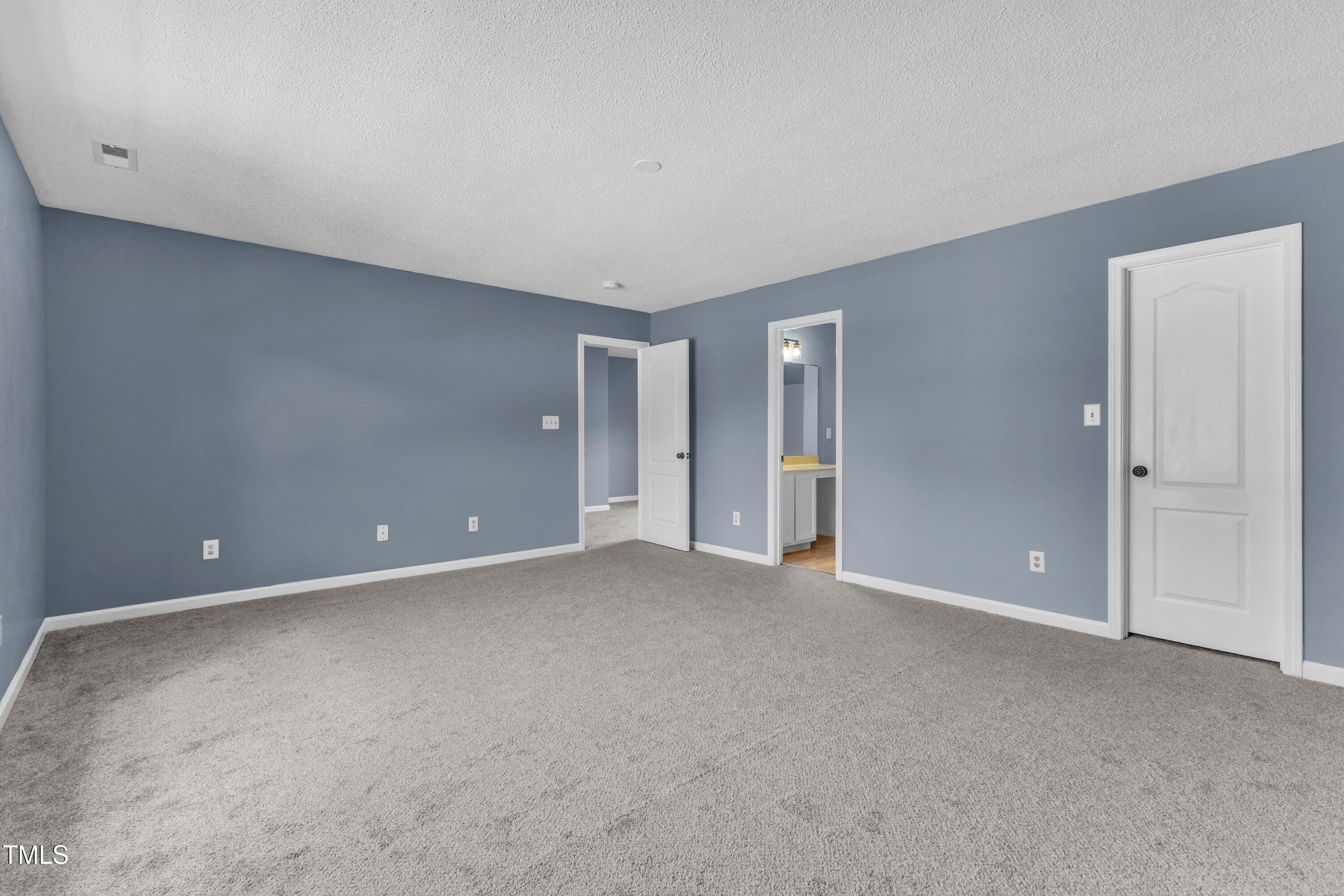 3604 Rivermist Drive Raleigh, NC 27610 - Photo 34 of 48 a view of an empty room