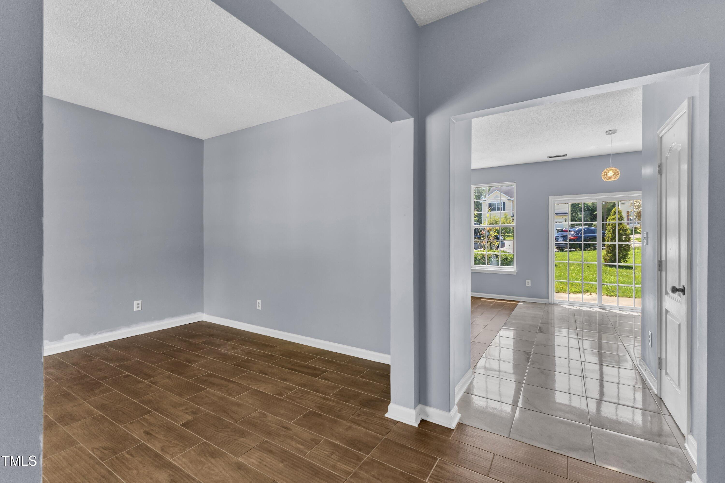 3604 Rivermist Drive Raleigh, NC 27610 - Photo 8 of 48 a view of an empty room and window