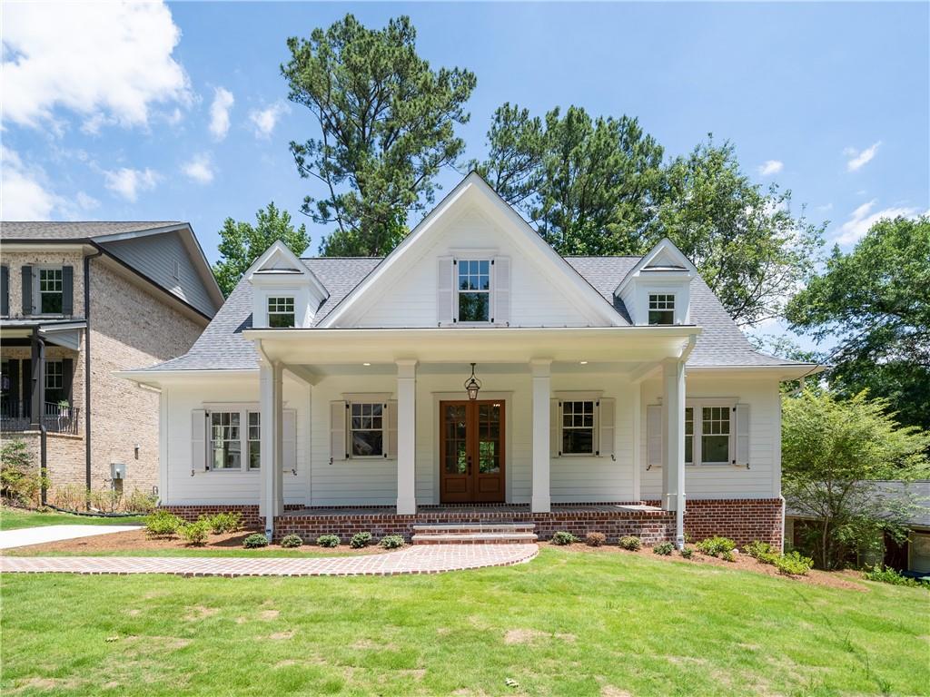 1767 Warren Court Northwest Atlanta, GA 30318 - Photo 1 of 1 a front view of a house with a yard
