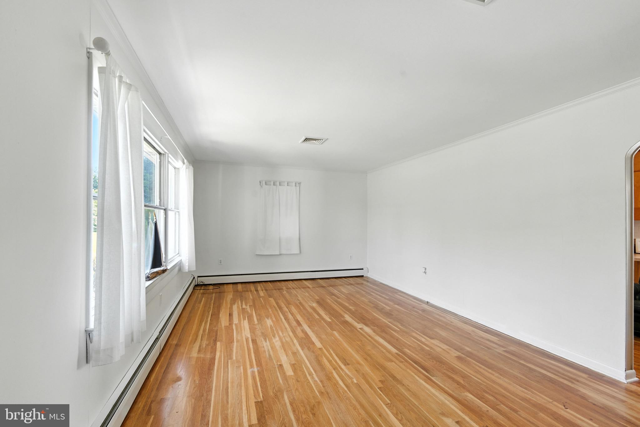 24415 Chestertown Road Chestertown, MD 21620 - Photo 16 of 29 a view of a room with wooden floor and a window