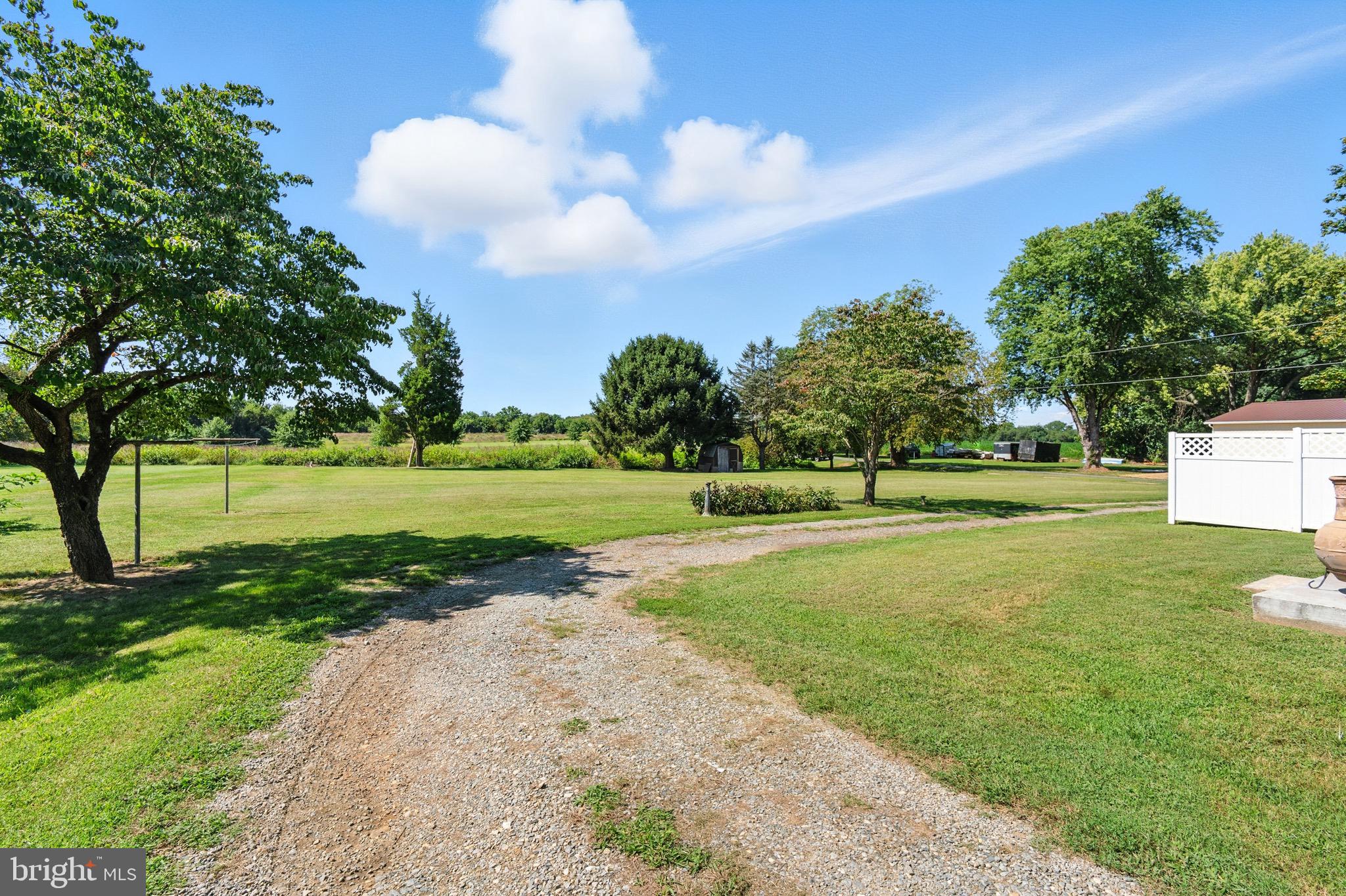 24415 Chestertown Road Chestertown, MD 21620 - Photo 19 of 29 a view of a golf course with a lake view