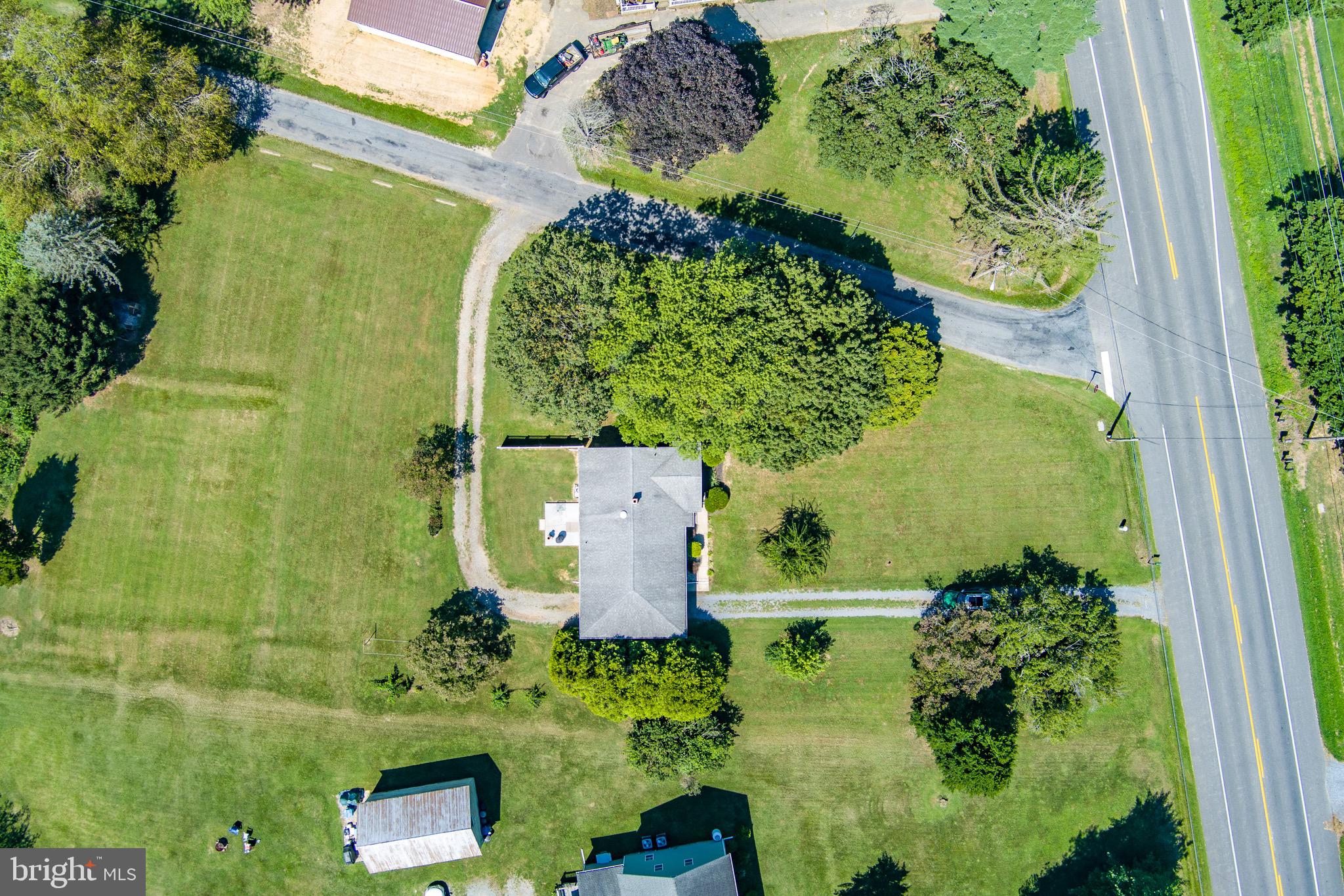24415 Chestertown Road Chestertown, MD 21620 - Photo 20 of 29 an aerial view of a residential house with a yard