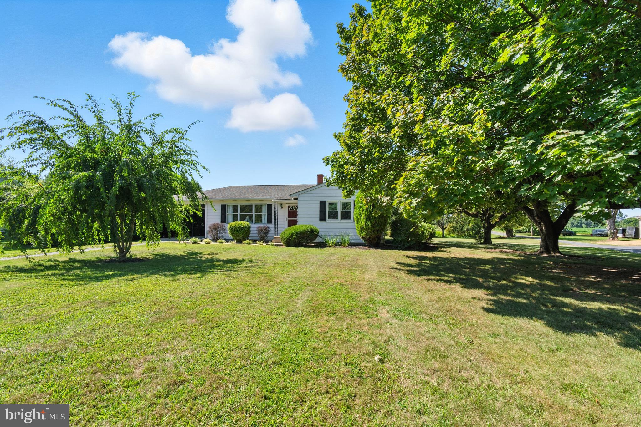 24415 Chestertown Road Chestertown, MD 21620 - Photo 2 of 29 a front view of a house with garden