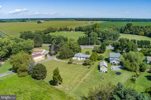 a garden view with a lake view