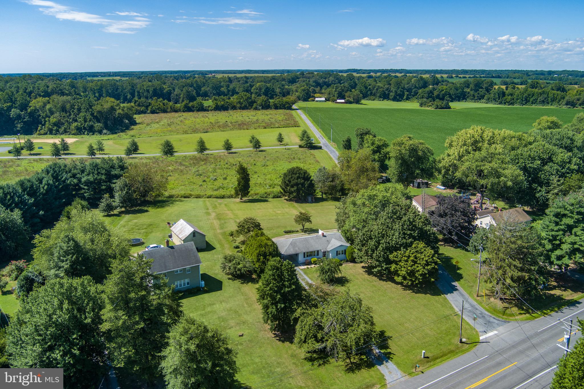 24415 Chestertown Road Chestertown, MD 21620 - Photo 29 of 29 an aerial view of a golf course with a garden