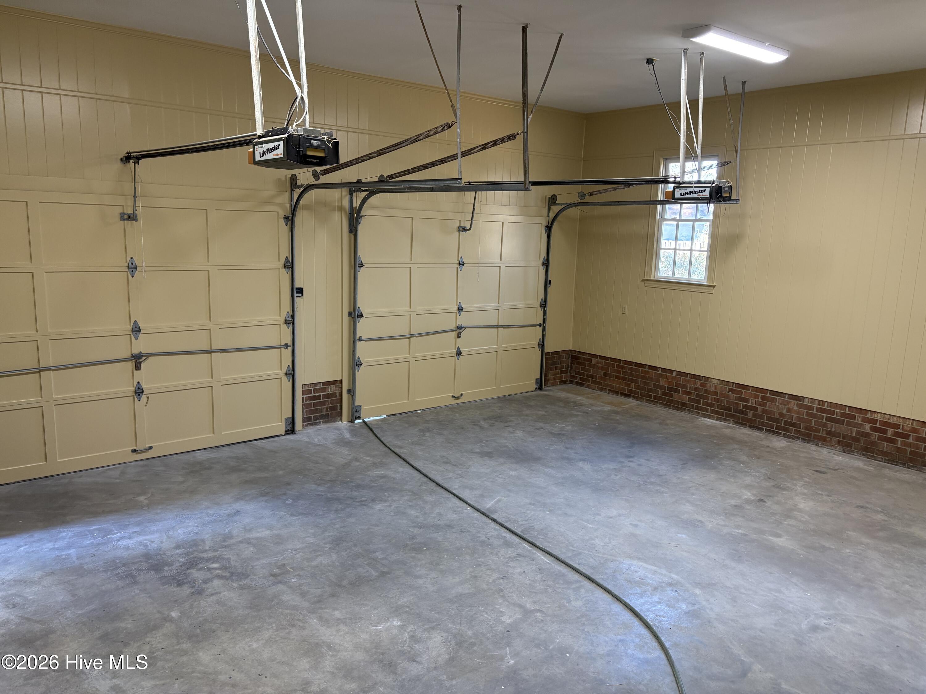 214 Alderson Road Washington, NC 27889 - Photo 49 of 49 2 car garage with high ceilings