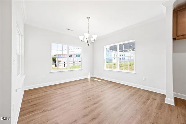 a view of a livingroom with wooden floor