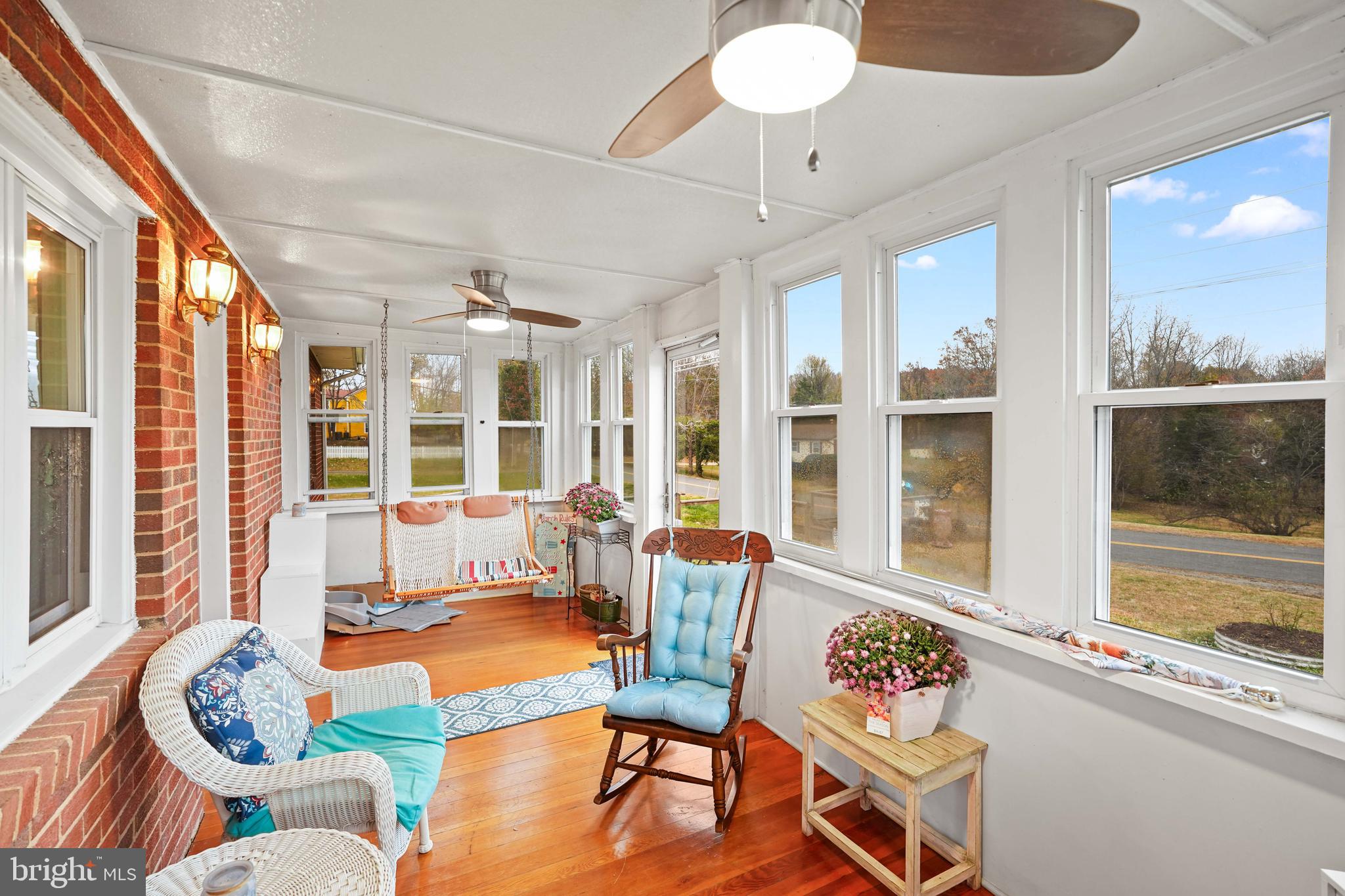 10012 Ellis Road Manassas, VA 20111 - Photo 13 of 54 a living room with furniture and a large window