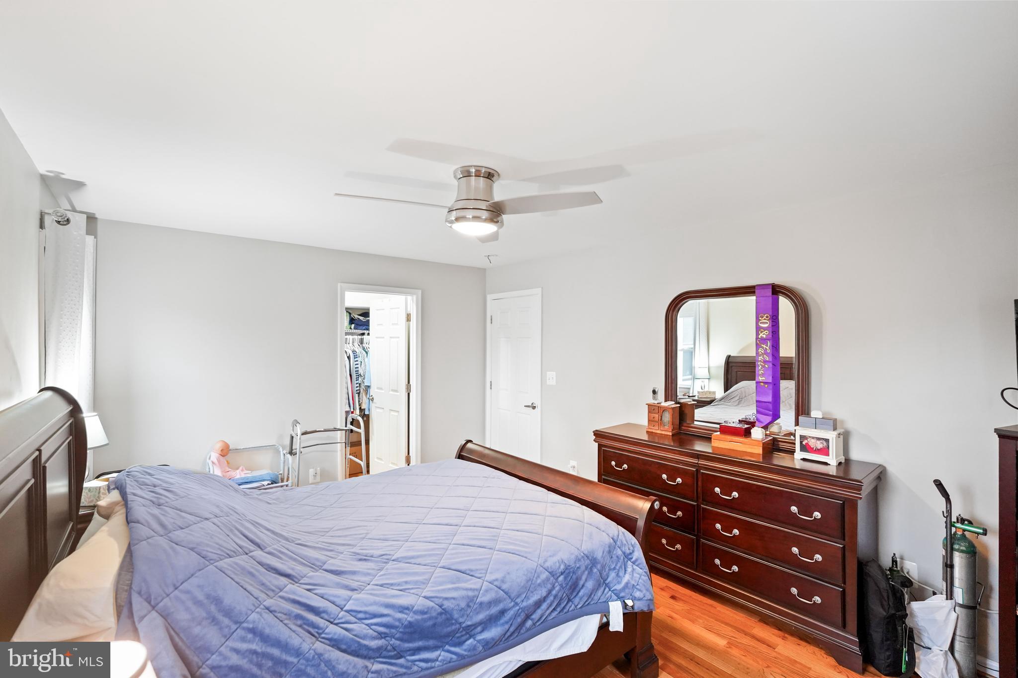 10012 Ellis Road Manassas, VA 20111 - Photo 26 of 54 a bedroom with a bed and dresser
