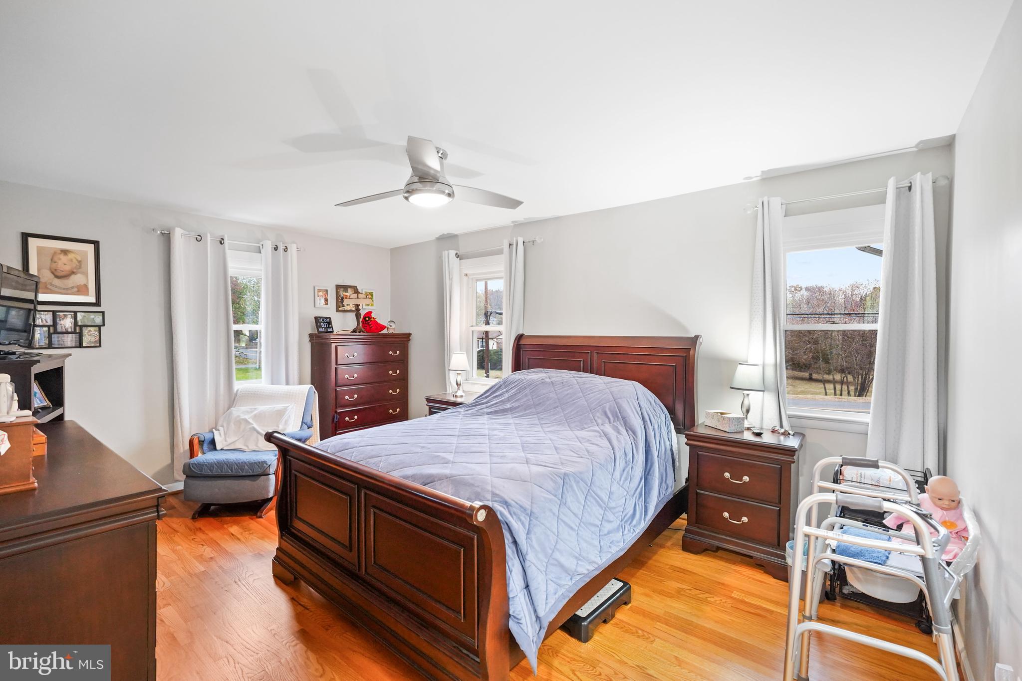 10012 Ellis Road Manassas, VA 20111 - Photo 27 of 54 a bedroom with a bed and a dresser