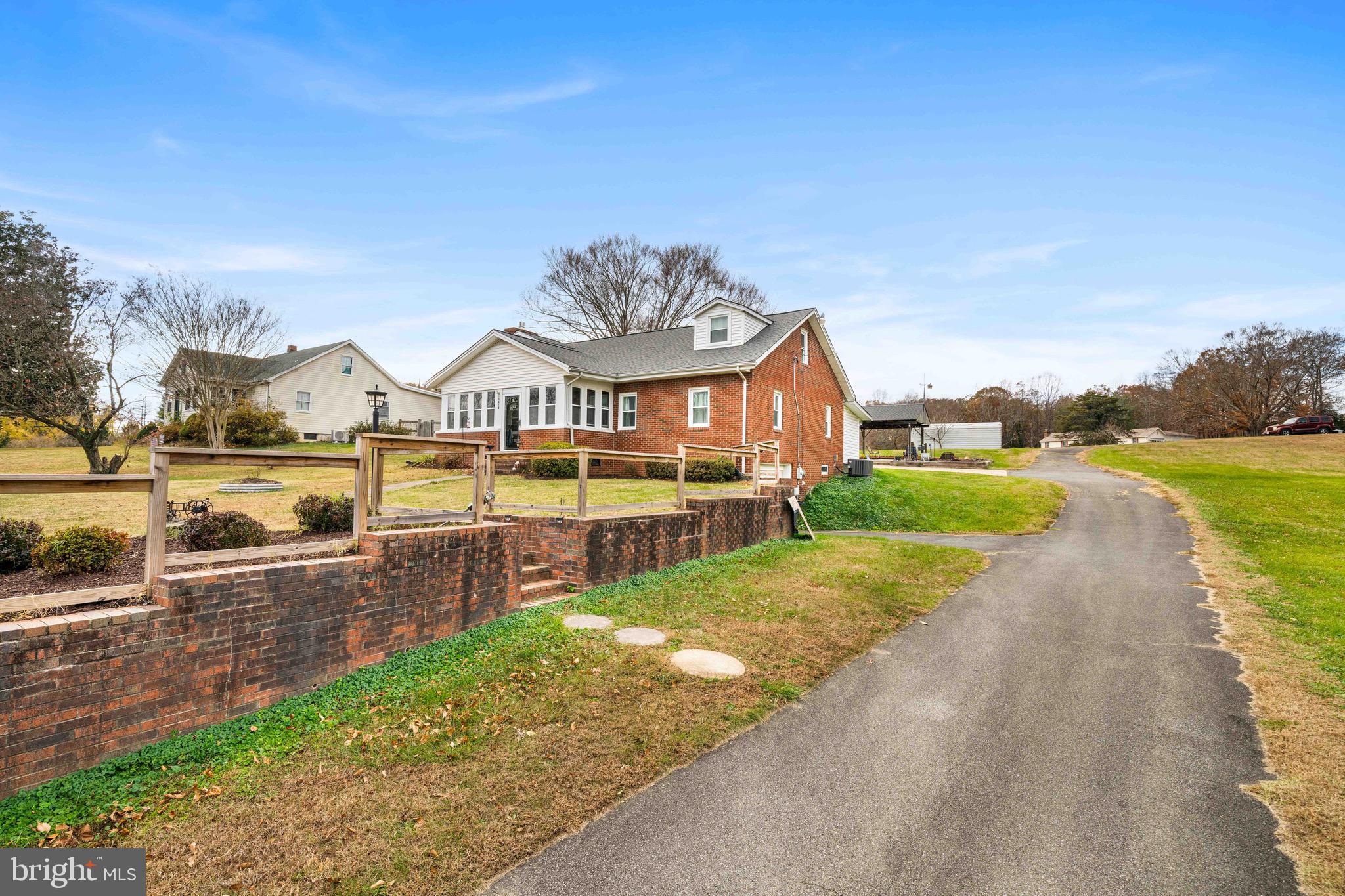 10012 Ellis Road Manassas, VA 20111 - Photo 4 of 54 a view of a city with houses next to a yard