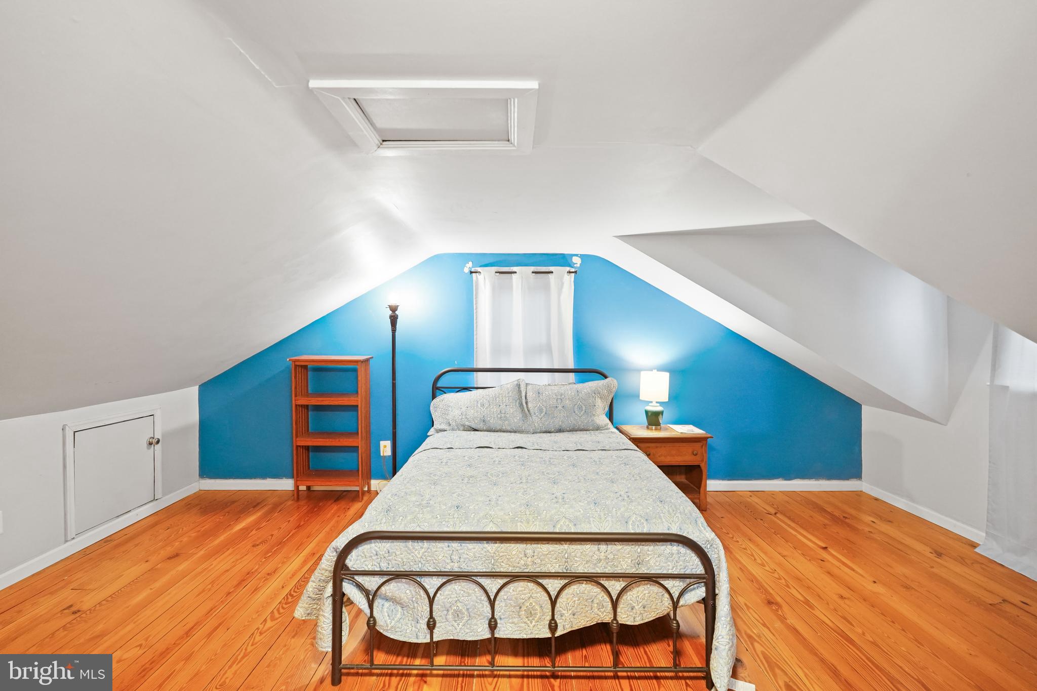 10012 Ellis Road Manassas, VA 20111 - Photo 44 of 54 a bed room with a bed and dresser