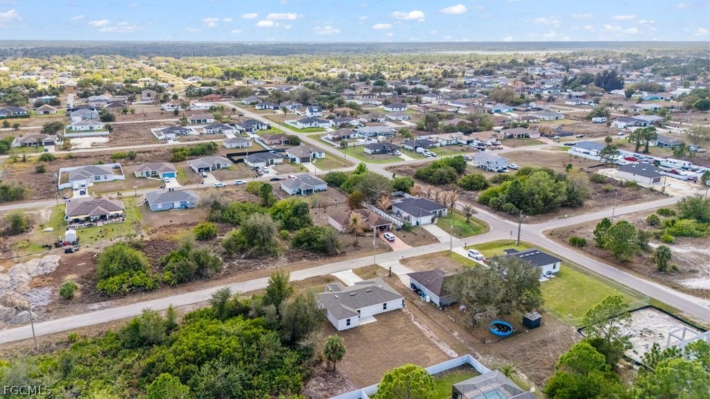 2512 42nd Street Southwest Lehigh Acres, FL 33976 - Photo 24 of 25 an aerial view of multiple house