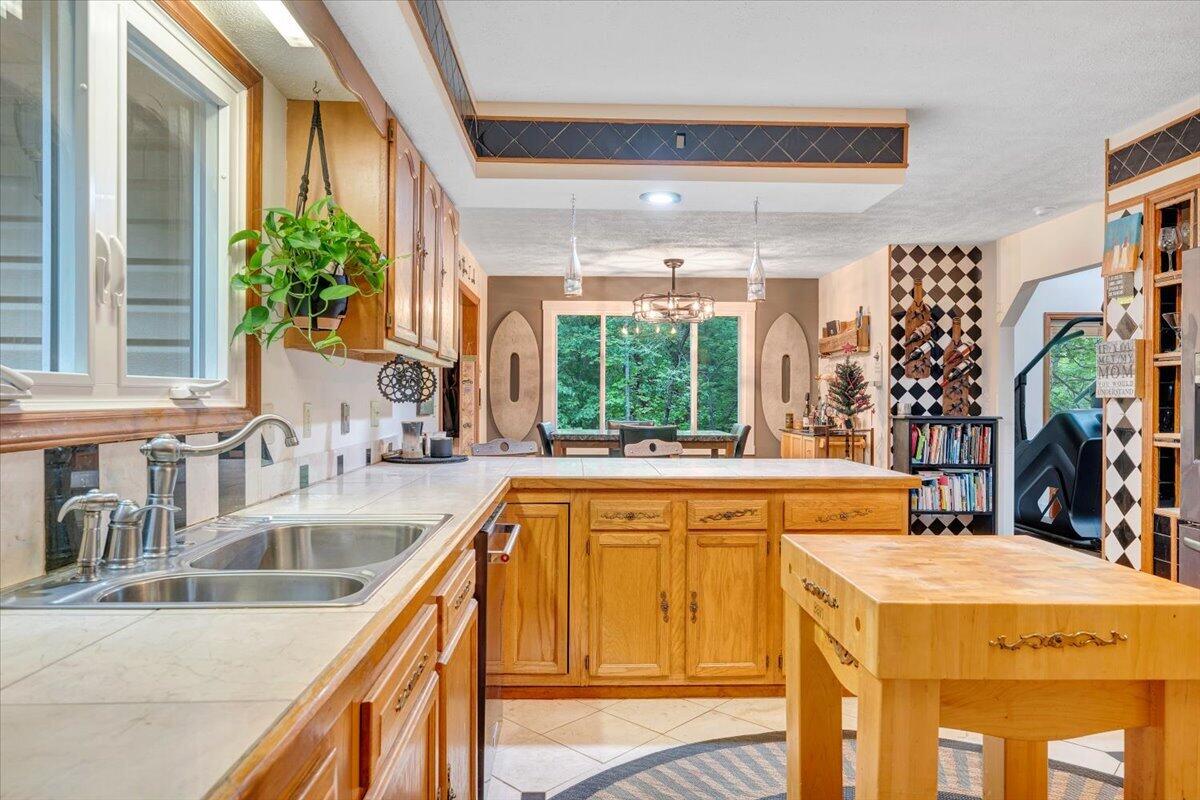 290 Silver Shadow Road Hardy, VA 24101 - Photo 16 of 62 a view of a kitchen with a large window and furniture