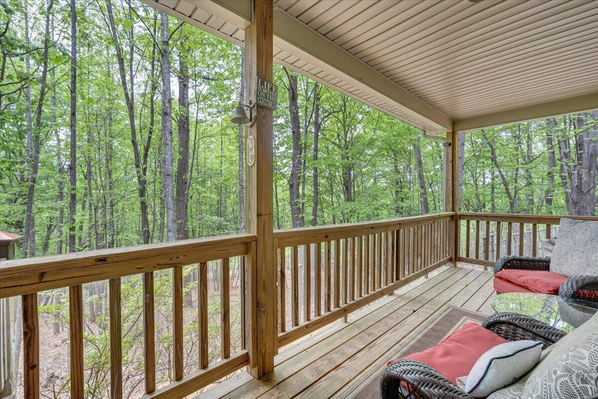 290 Silver Shadow Road Hardy, VA 24101 - Photo 2 of 62 a view of a two chairs in the balcony