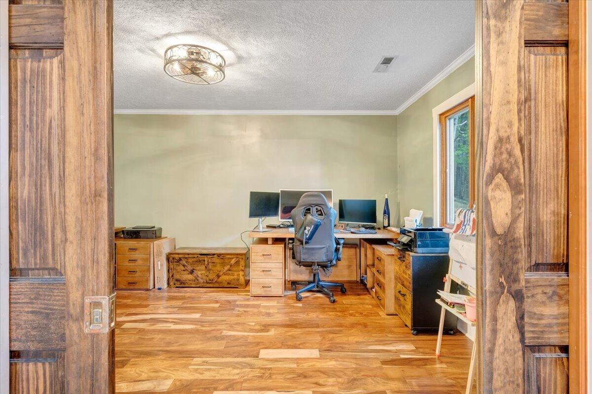 290 Silver Shadow Road Hardy, VA 24101 - Photo 27 of 62 a view of a workspace with furniture and a window