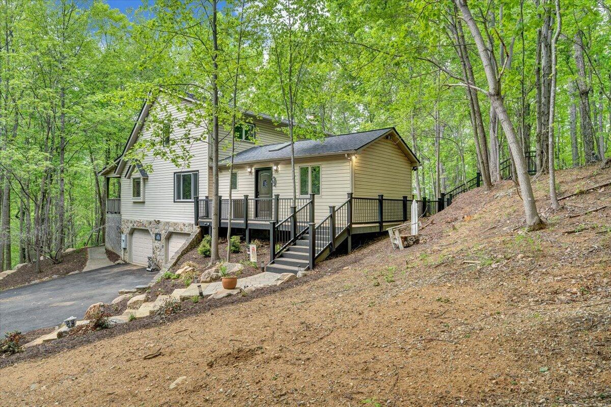 290 Silver Shadow Road Hardy, VA 24101 - Photo 53 of 62 a view of a house with a yard and sitting area