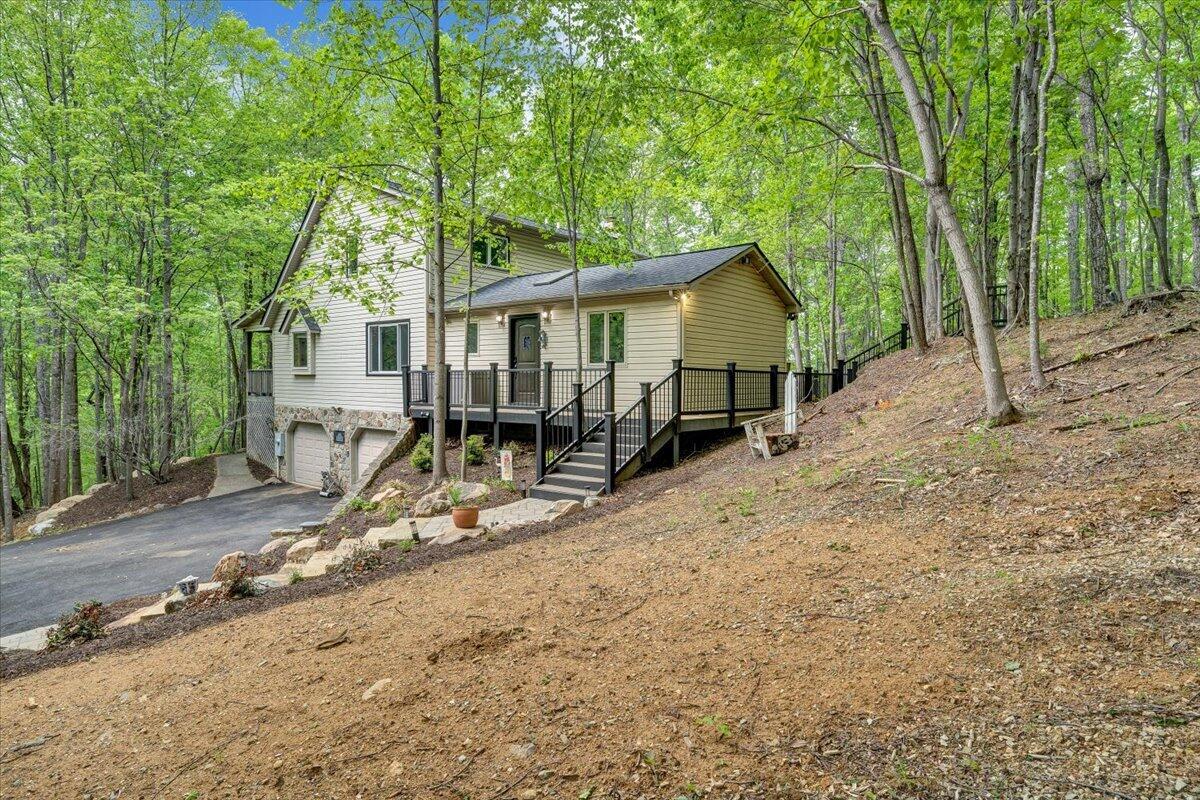 290 Silver Shadow Road Hardy, VA 24101 - Photo 54 of 62 a view of house with a outdoor space