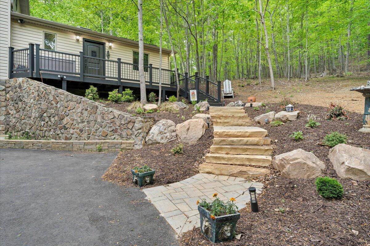 290 Silver Shadow Road Hardy, VA 24101 - Photo 56 of 62 a view of a backyard with sitting area