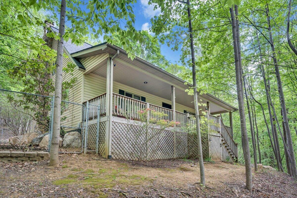 290 Silver Shadow Road Hardy, VA 24101 - Photo 58 of 62 a house with a tree in the yard