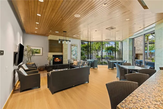 a outdoor space with patio couches and a potted plant