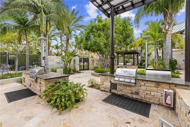 a swimming pool with outdoor seating and yard