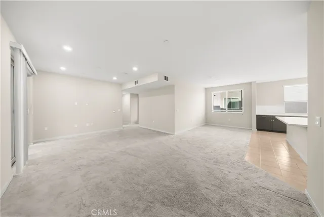 a view of empty room with a workspace