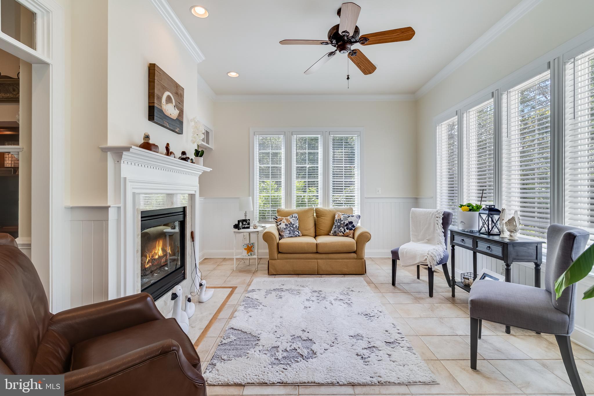 11375 Ethan Court Swan Point, MD 20645 - Photo 13 of 55 a living room with furniture and a fireplace