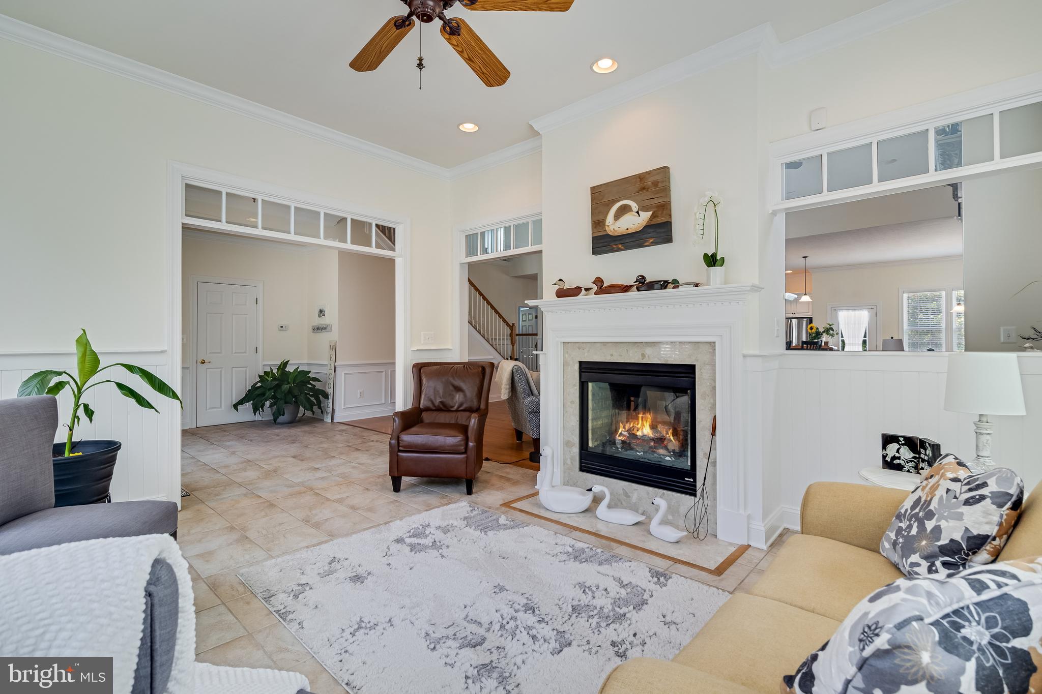 11375 Ethan Court Swan Point, MD 20645 - Photo 14 of 55 a living room with furniture and a fireplace