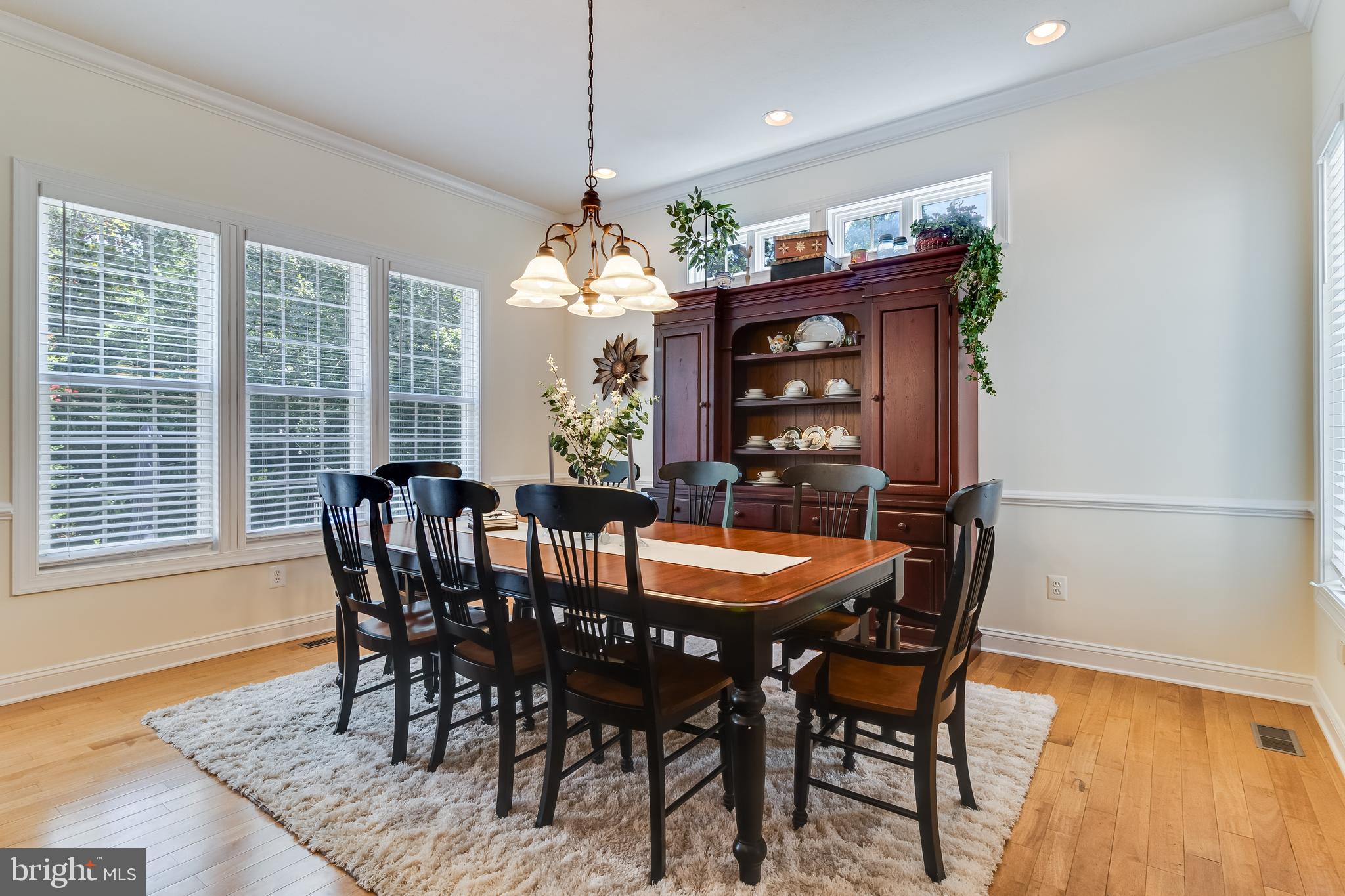 11375 Ethan Court Swan Point, MD 20645 - Photo 17 of 55 a view of a dining room with furniture window and wooden floor