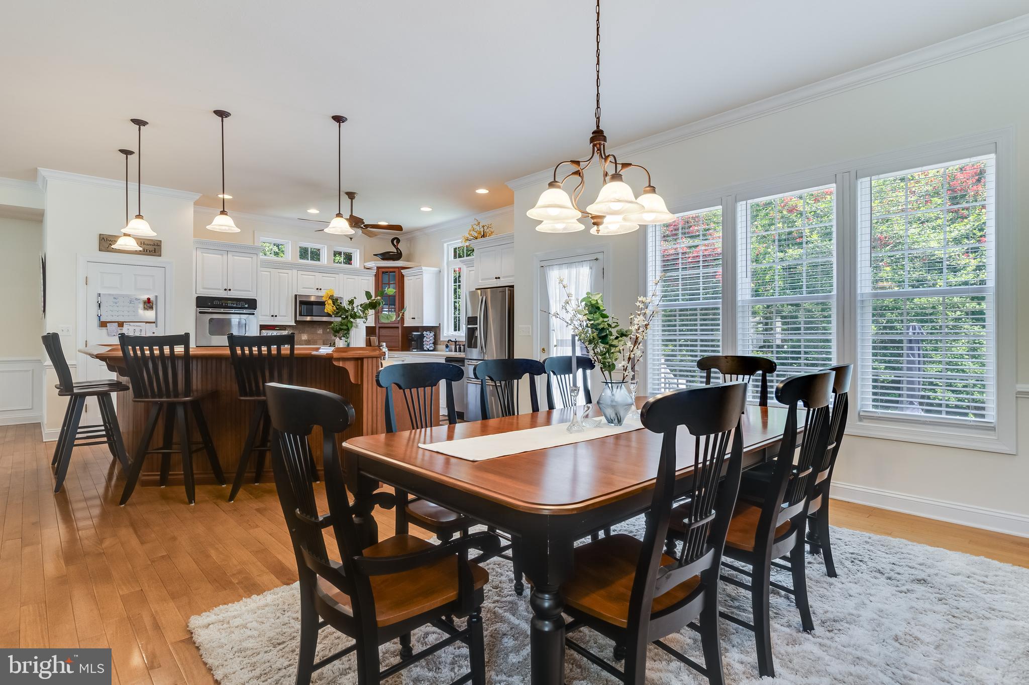 11375 Ethan Court Swan Point, MD 20645 - Photo 18 of 55 a view of a dining room with furniture window and wooden floor