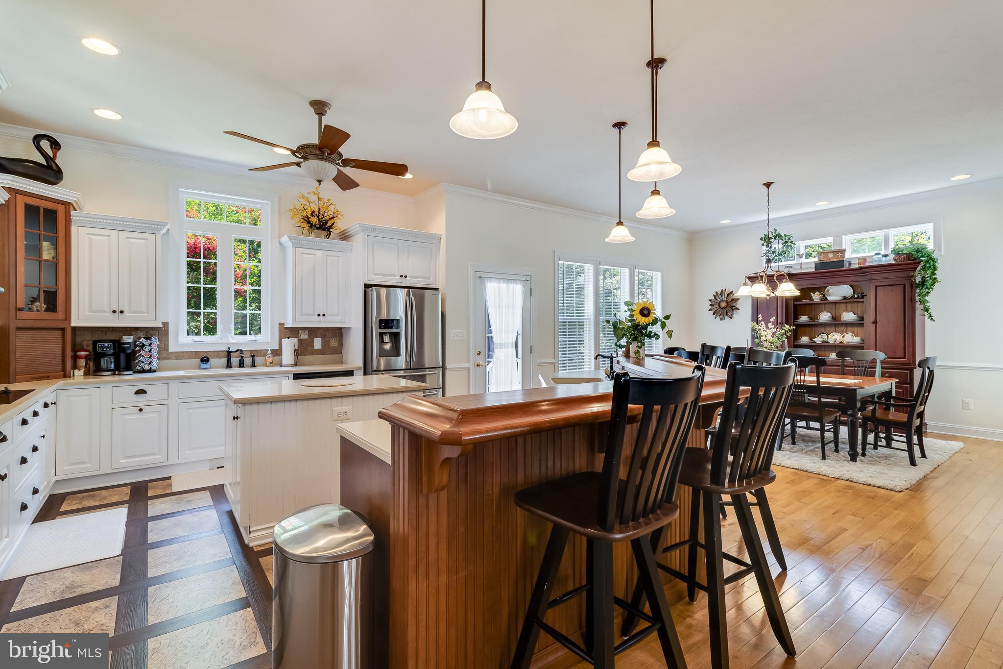 11375 Ethan Court Swan Point, MD 20645 - Photo 22 of 55 a view of a dining room with furniture and wooden floor