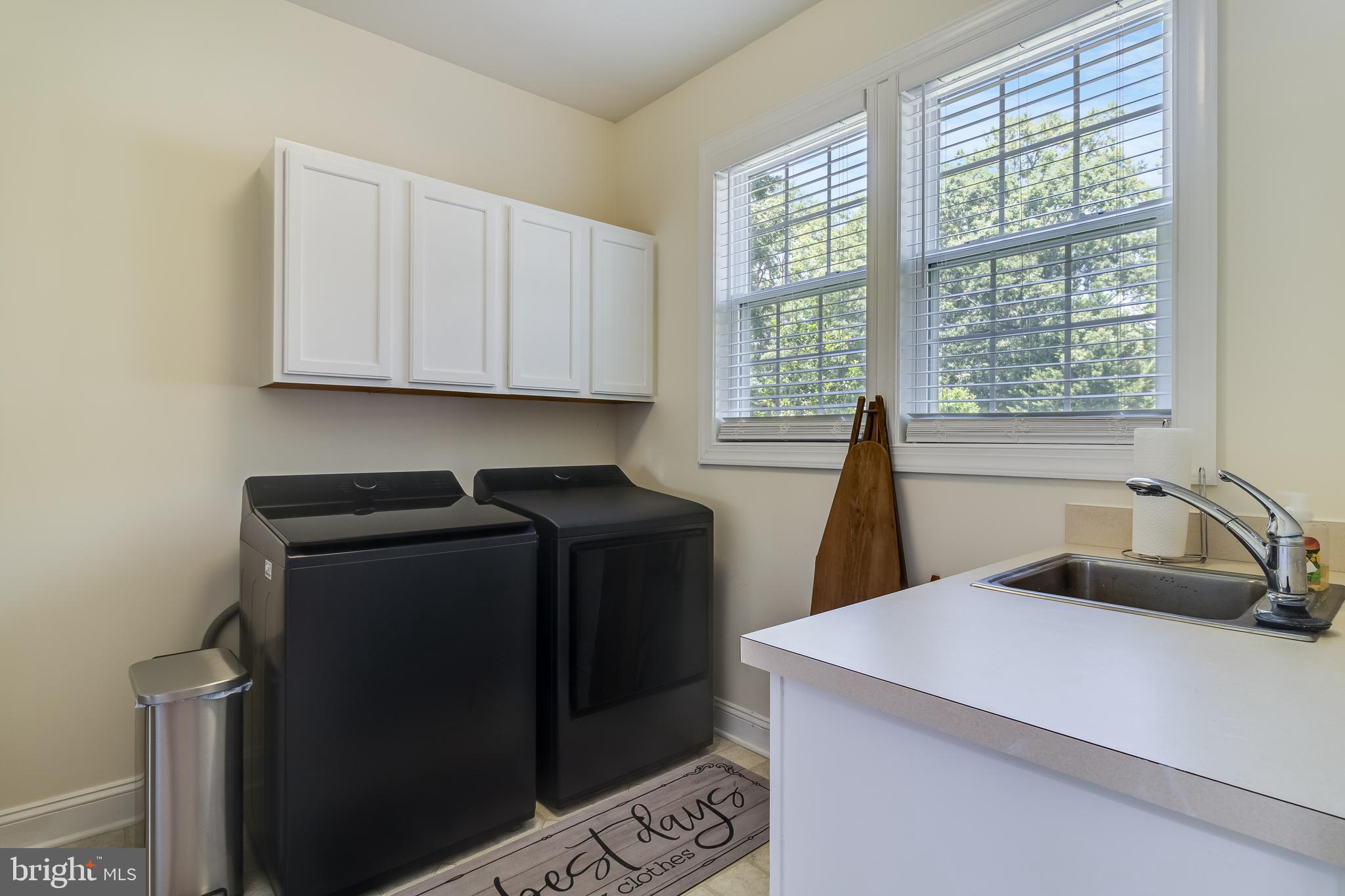11375 Ethan Court Swan Point, MD 20645 - Photo 34 of 55 a kitchen with a refrigerator and window