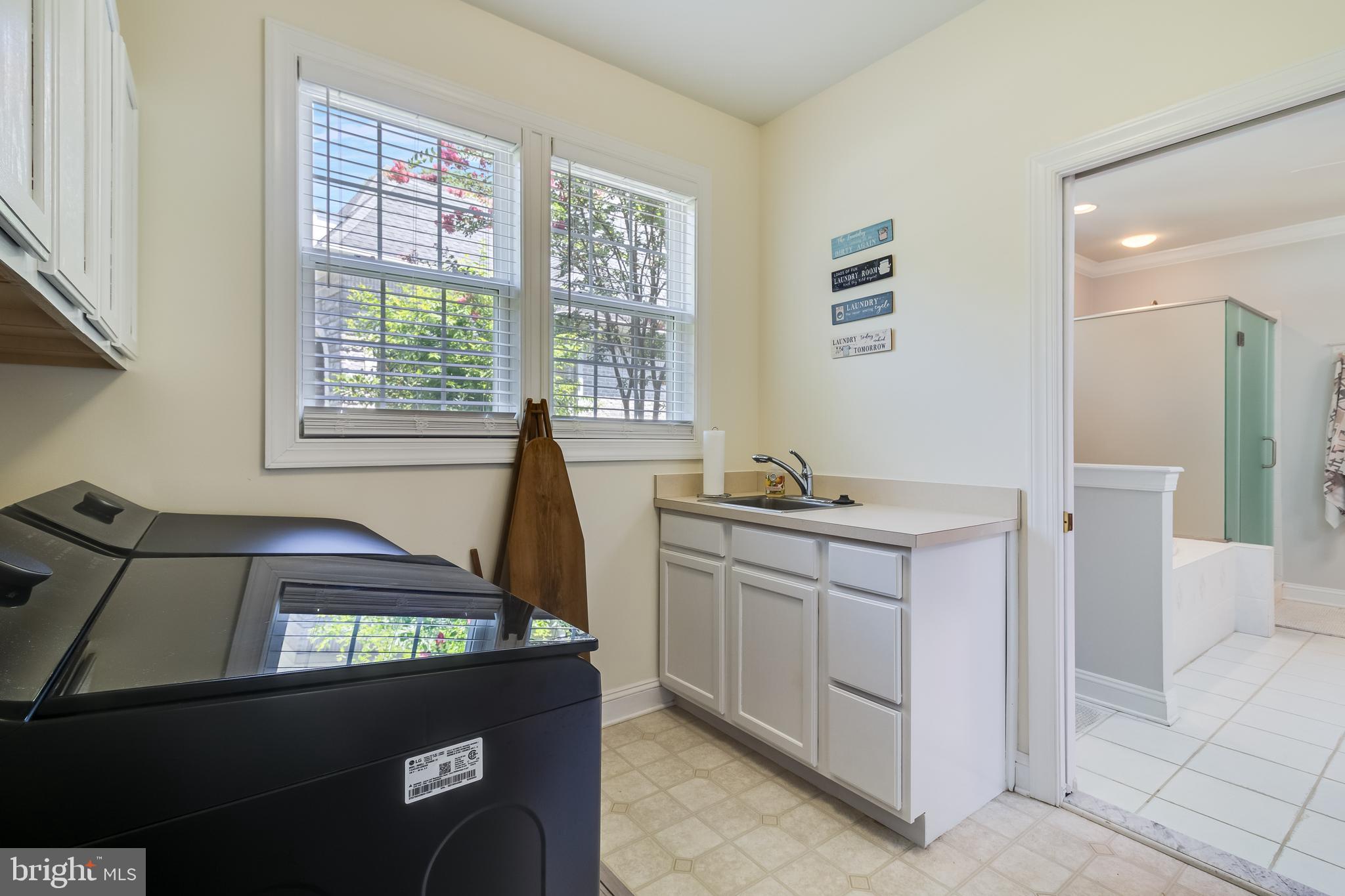 11375 Ethan Court Swan Point, MD 20645 - Photo 35 of 55 a kitchen with a sink and a stove top oven
